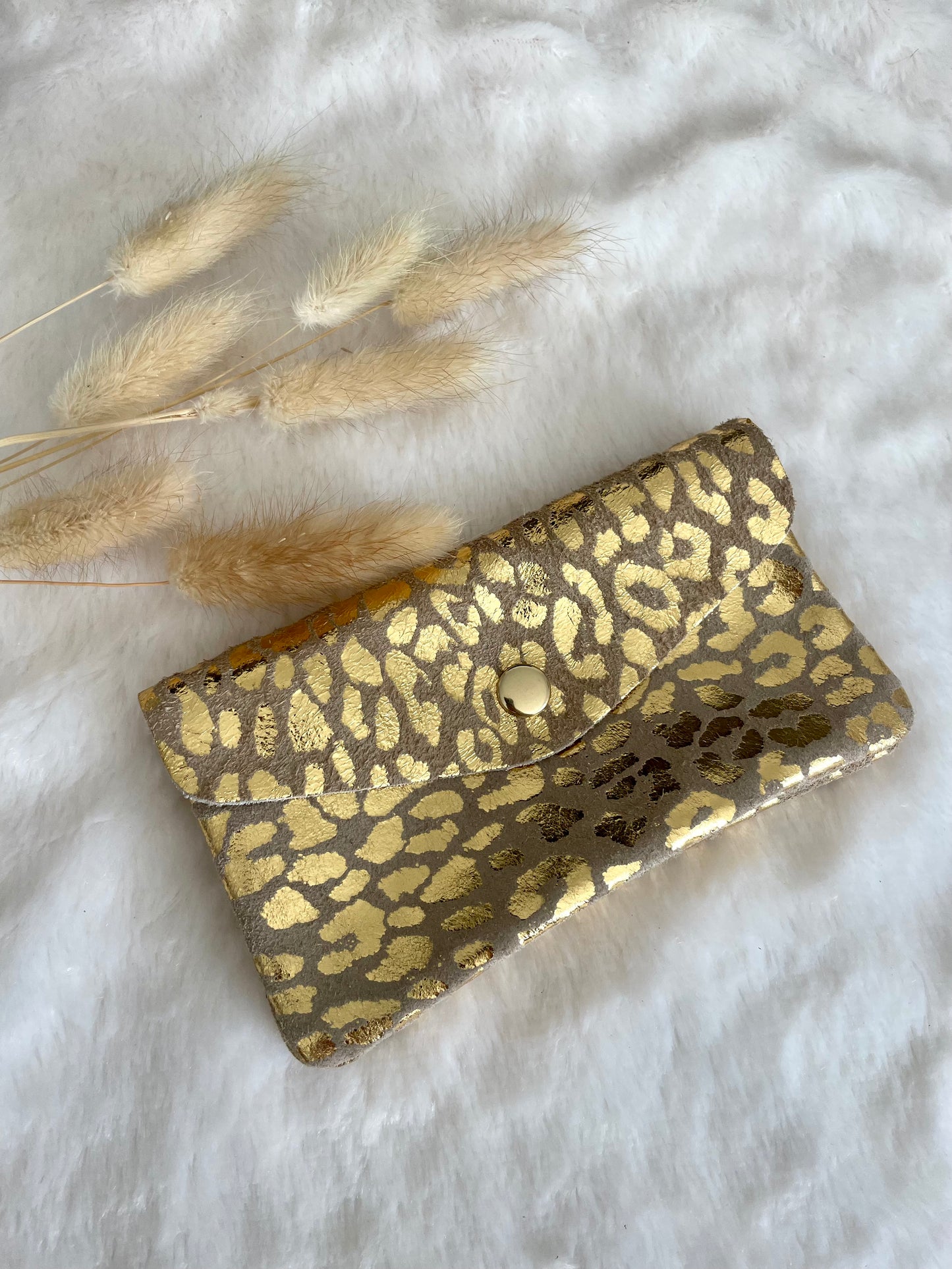 Pochette léopard doré